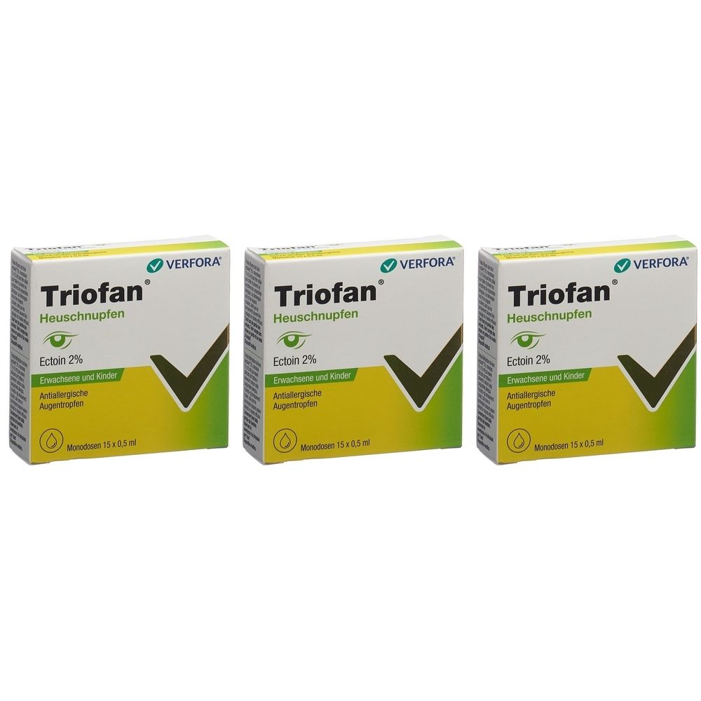 Drie dozen TRIOFAN Heuschnupfen Augentropfen. Witte dozen met groene en gele accenten. Tekst: Ectoin 2%, antiallergische oogdruppels.