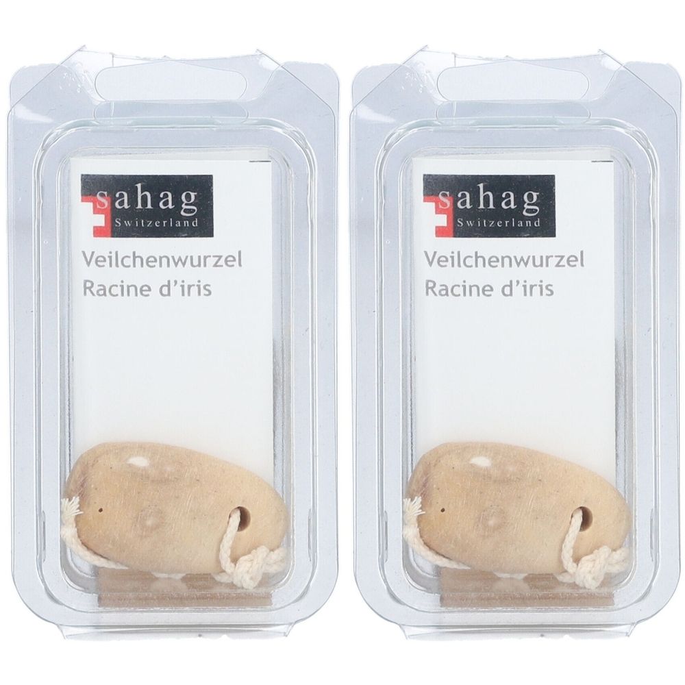 Deux emballages de Sahag racine d'iris. Chaque emballage contient une racine beige avec cordon, emballée dans un blister transparent.