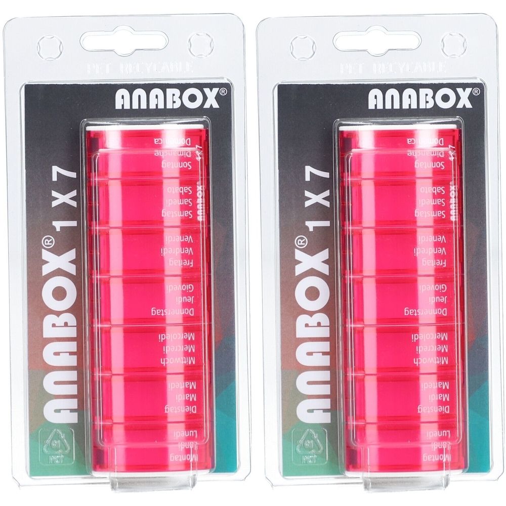 Deux boîtes de piluliers ANABOX®. Pilulier rose à sept compartiments, avec jours de la semaine. Emballage blister transparent.