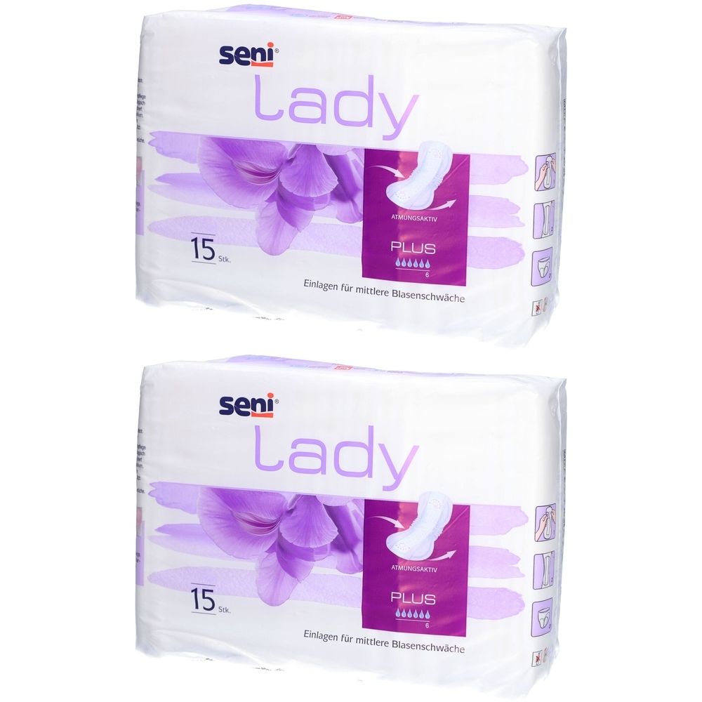 Deux paquets de serviettes SENI Lady Plus. Emballage blanc avec accents violets et image du produit. Inscription: Lady, 15 pièces, Plus.
