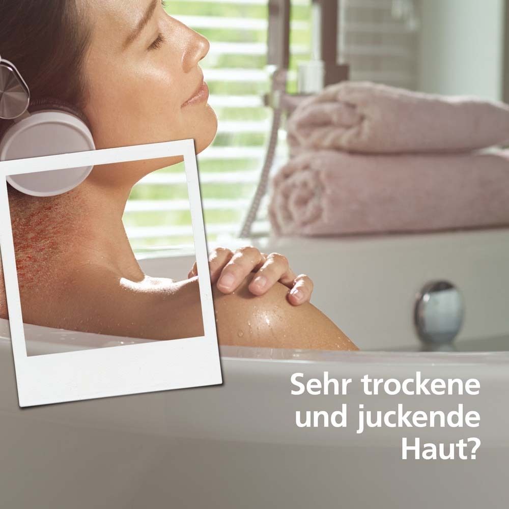 Femme dans une baignoire. Texte: Peau très sèche et qui démange?