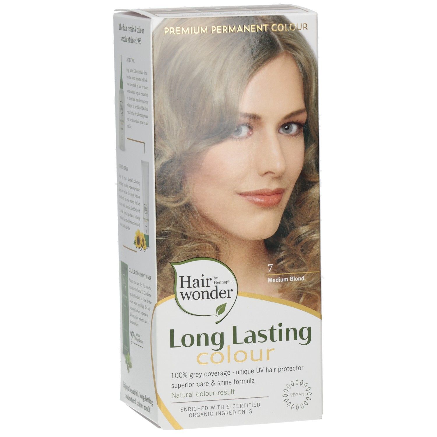 Haarkleurverpakking met modelafbeelding, "Long Lasting Colour 7 Medium Blond" opschrift.