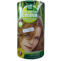 Boîte Hennaplus. Coloration longue durée blond moyen 7,3. Femme aux cheveux blonds. Autocollant avec code produit.