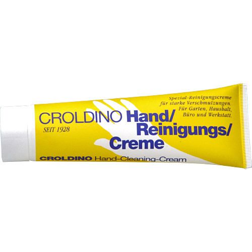 Gele tube met "CROLIDINO Hand/Reinigungs/Creme". Tekst: "SEIT 1928".