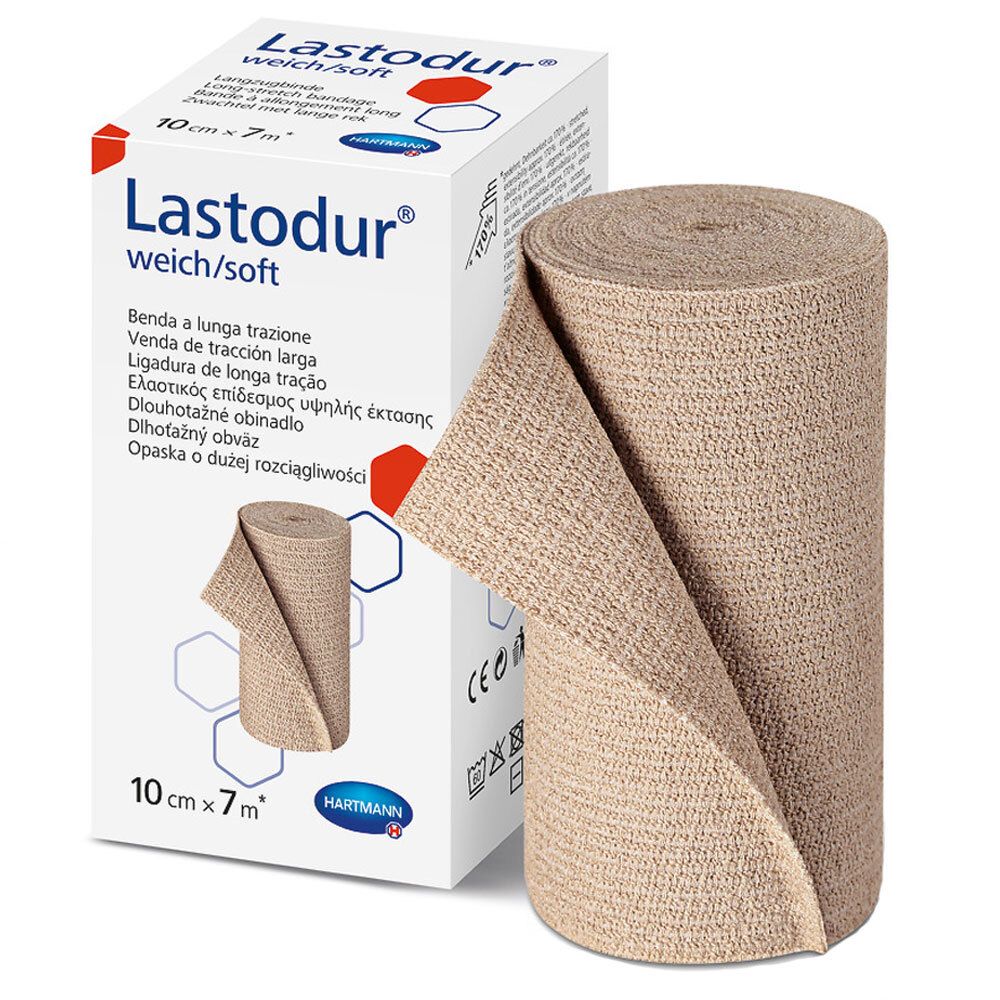 Bande de compression beige partiellement déroulée, à côté de l'emballage. Emballage avec nom du produit, marque Hartmann et taille.