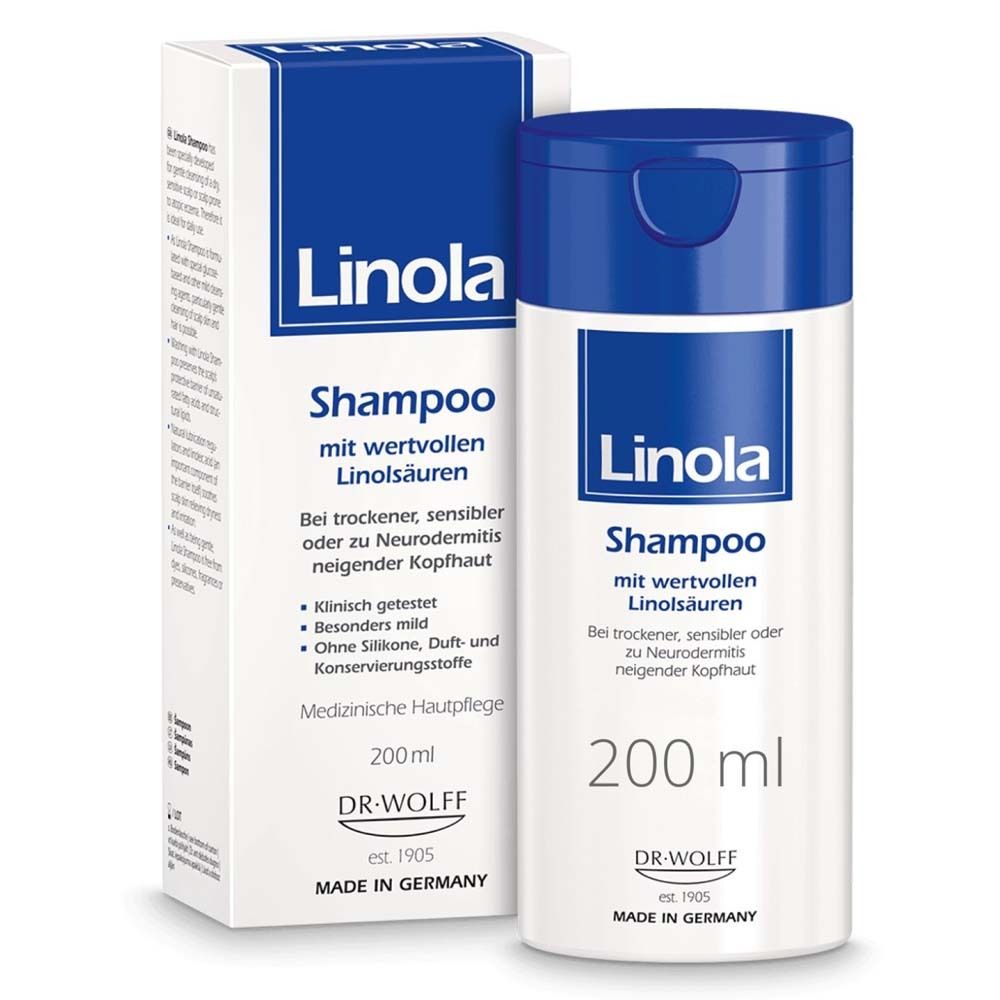 Linola shampoo fles en verpakking. Blauw-wit. Tekst: Shampoo, 200 ml, voor droge, gevoelige hoofdhuid. Dr. Wolff.