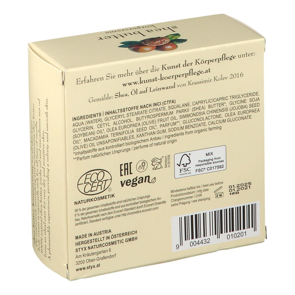 Crèmepot met deksel. Op deksel: STYX, sheabutter bodycrème. Afbeelding van sheanoten en bladeren.