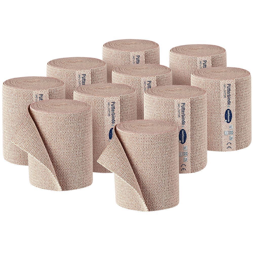 Tien rollen Pütterbinde. Beige elastische bandages. Op elke rol staat Pütterbinde. Fabrikant: Hartmann. CE-markering.