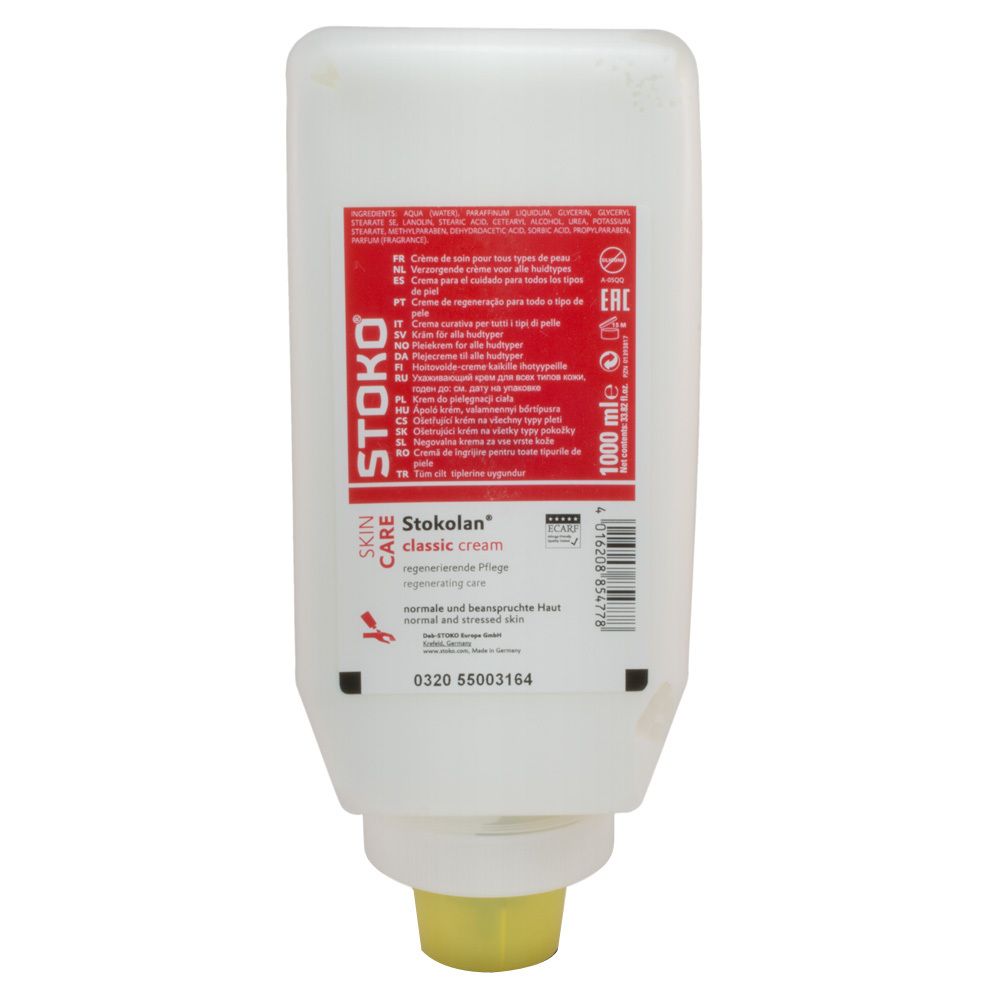 Stokolan Classic Cream dispenser. Witte container met rood etiket. Gele uitlaat. Tekst: Stokolan, Skin Care, classic cream.