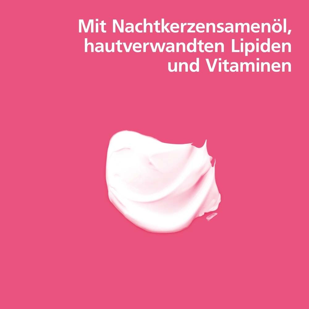 Crème op roze achtergrond. Tekst: Met teunisbloemolie, lipiden en vitaminen.