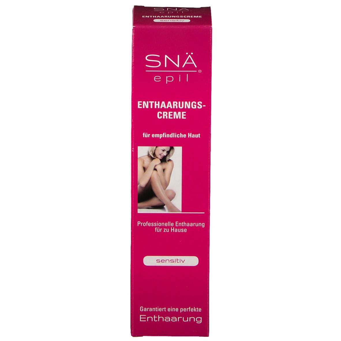 Roze kartonnen verpakking. Opschrift: SNÄ epil, Ontharingscrème, voor gevoelige huid. Afbeelding van een vrouw. 'Sensitiv'.