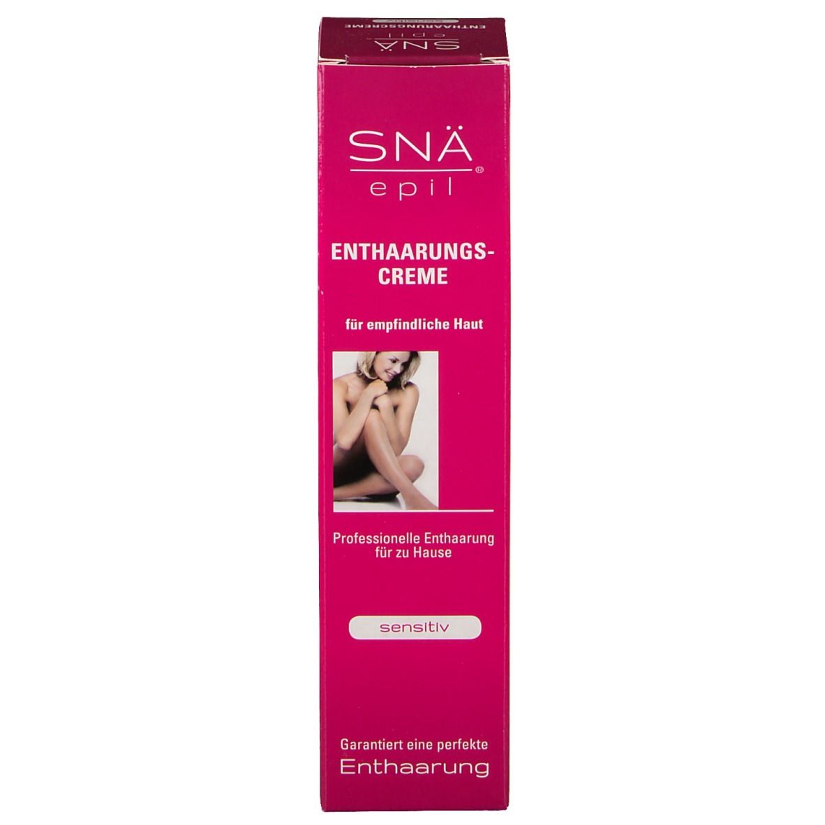 Roze kartonnen verpakking. Opschrift: SNÄ epil, Ontharingscrème, voor gevoelige huid. Afbeelding van een vrouw. 'Sensitiv'.