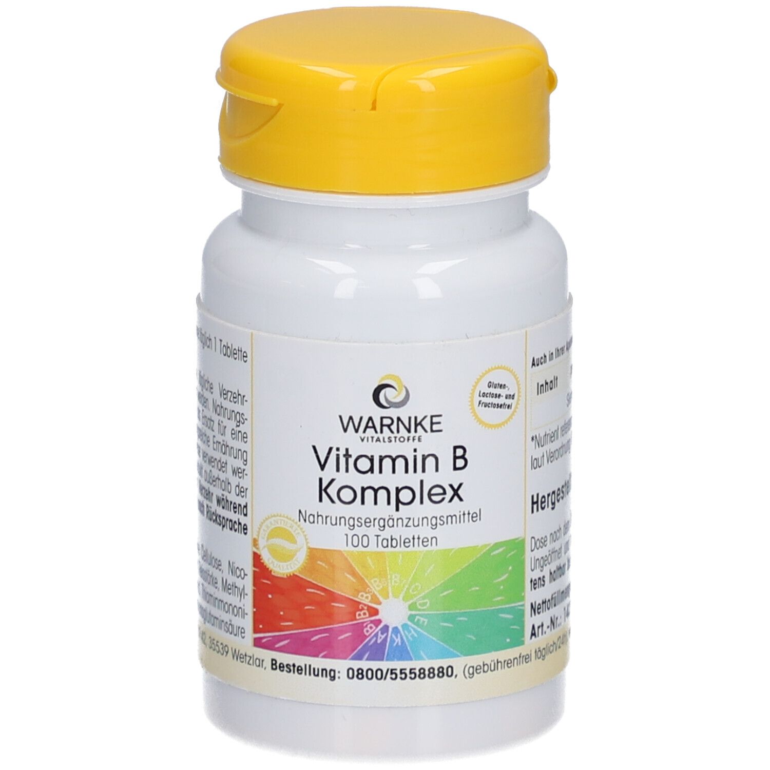 Witte tablettenfles met gele dop. Opschrift: WARNKE Vitamin B Komplex. 100 tabletten. Gekleurde achtergrond.