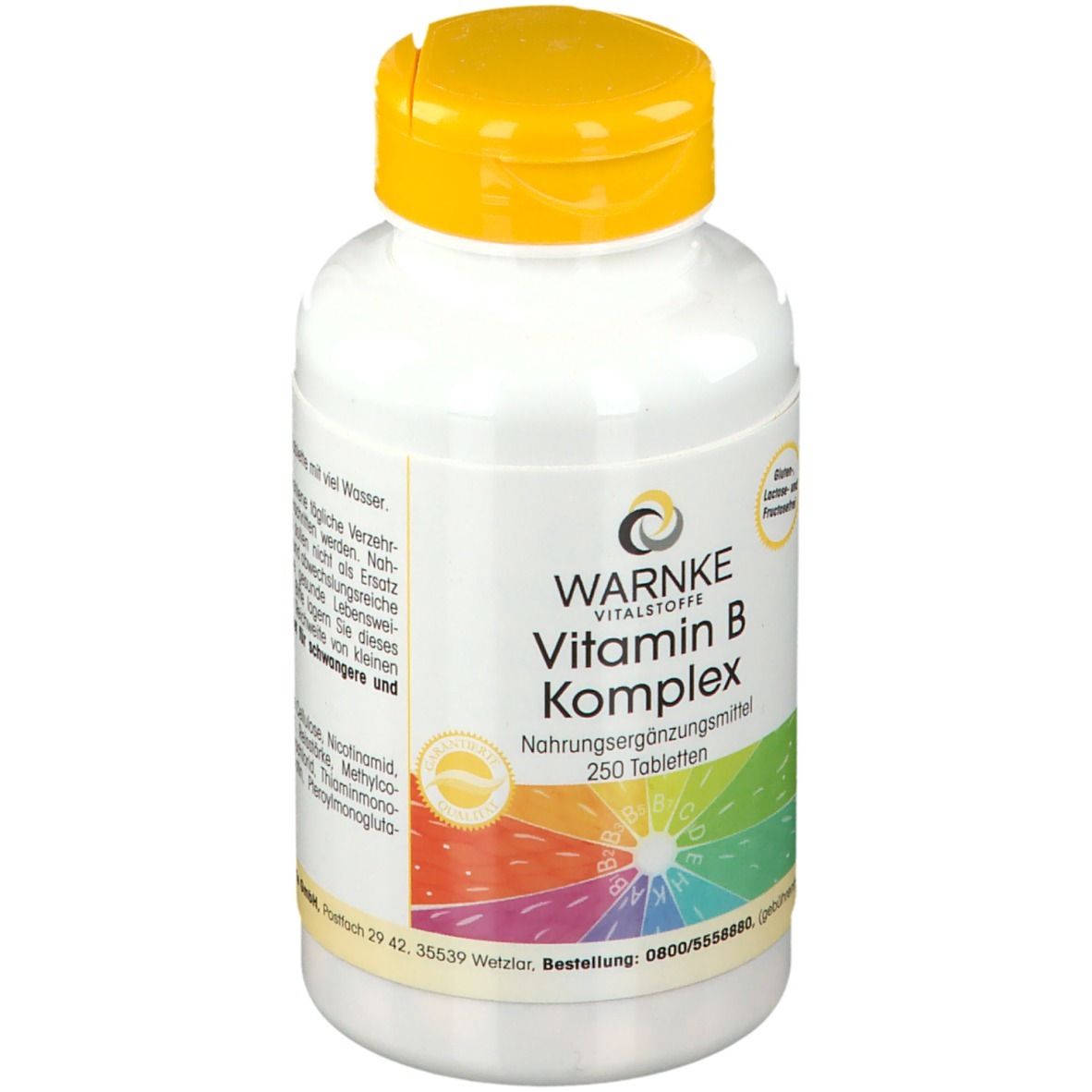 Witte fles met gele dop. Opschrift: WARNKE Vitamin B Komplex, 250 tabletten. Kleurrijke regenboog.