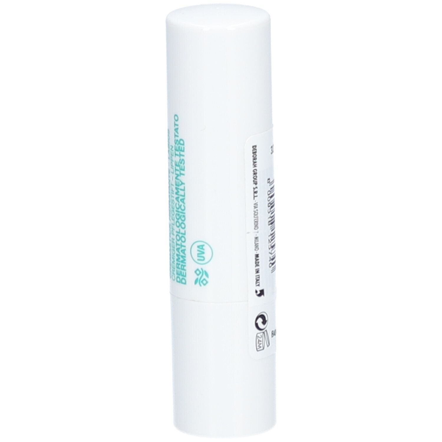 Stick à lèvres blanc. Inscription: Testé dermatologiquement, logo UVA. Texte au dos.