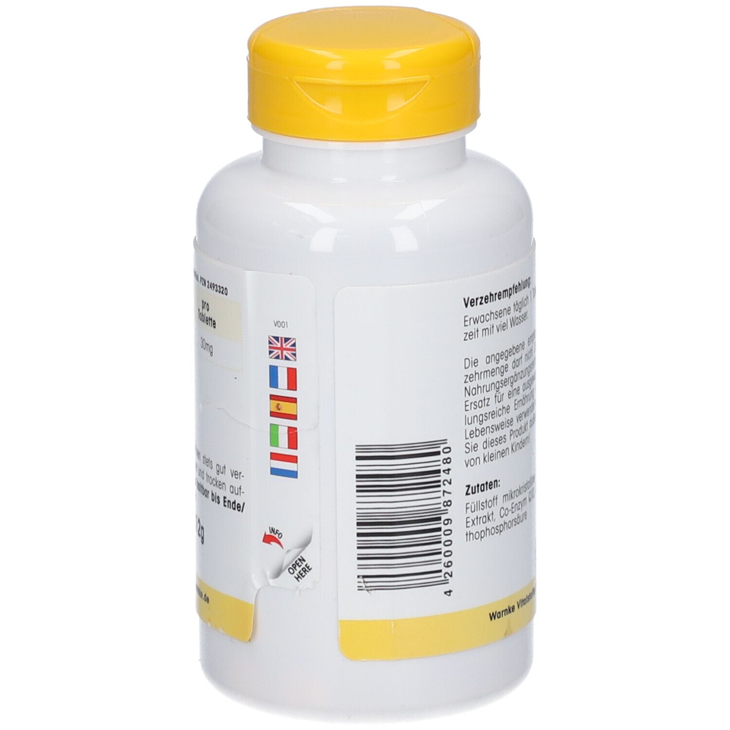 Dos du flacon blanc à bouchon jaune. Texte, drapeaux et indication d'ouverture. Warnke Vitalstoffe GmbH.