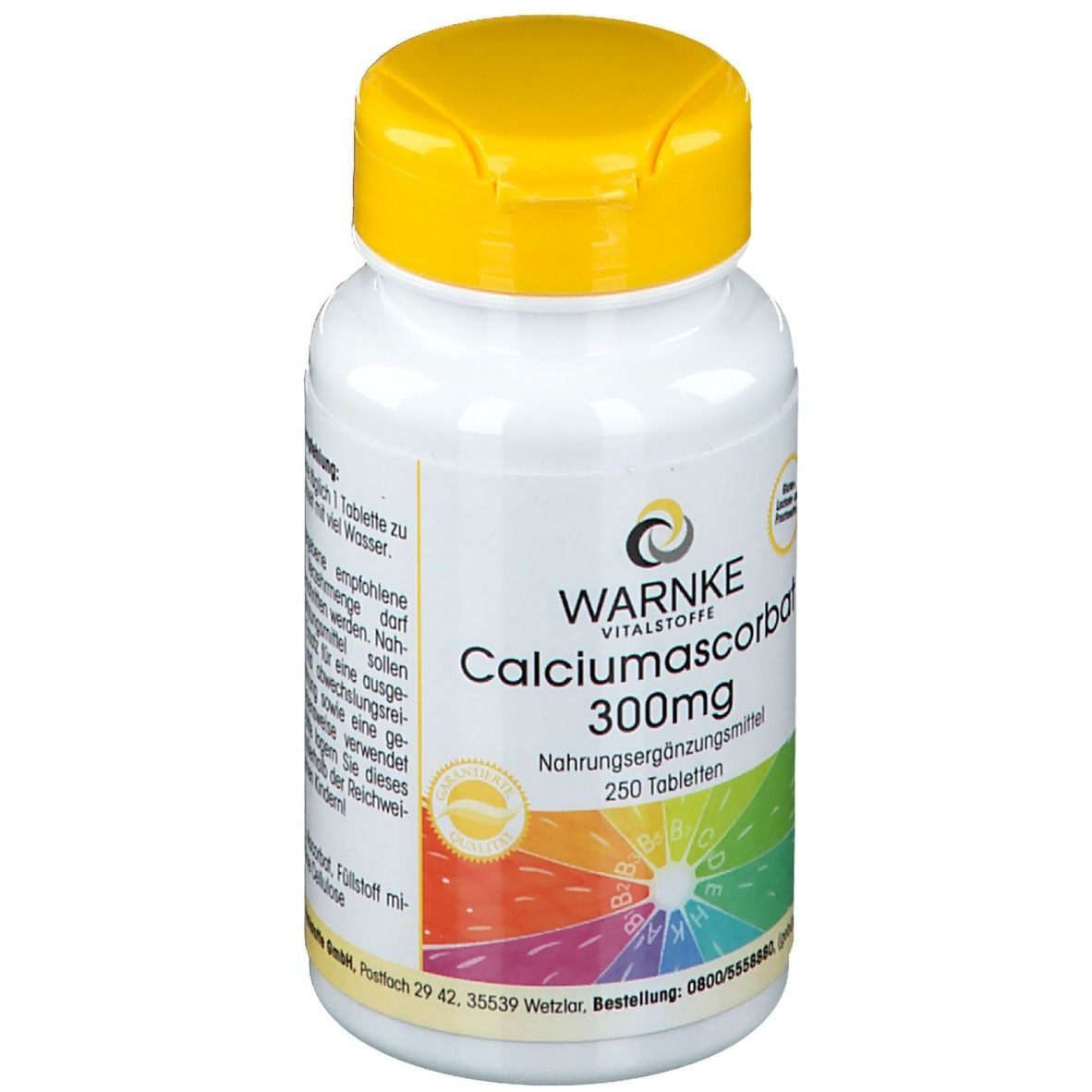 Witte fles met gele dop. Opschrift: WARNKE Calciumascorbat 300mg. 250 tabletten. Voedingssupplement.