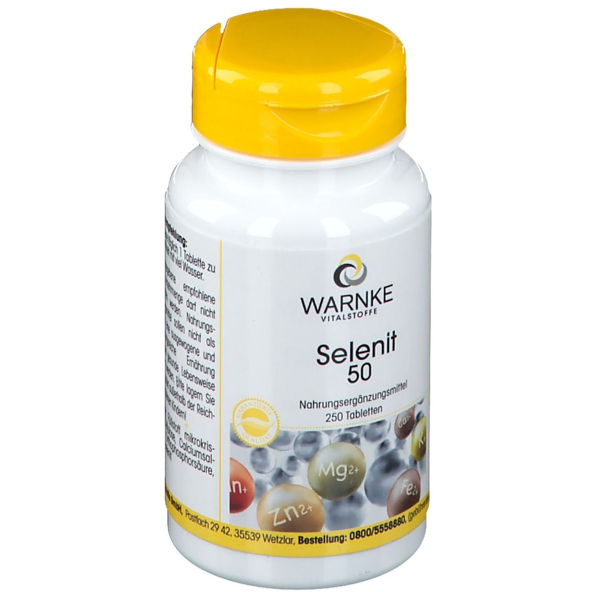 Flacon blanc à bouchon jaune. Inscription : WARNKE Selenit 50. 250 comprimés. Complément alimentaire. Illustration de minéraux.