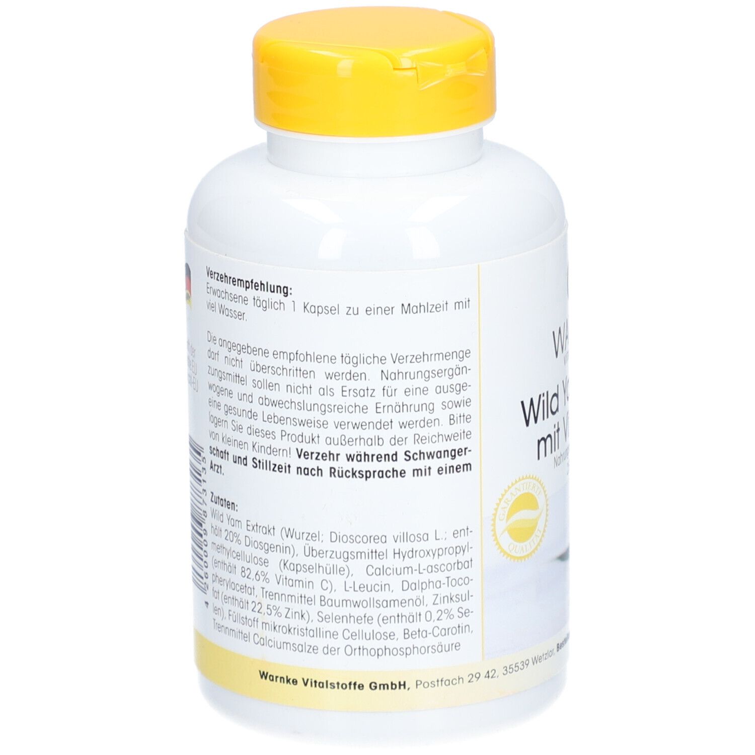 Achterkant van de fles. Tekst met ingrediënten en aanbevelingen. Gele dop.