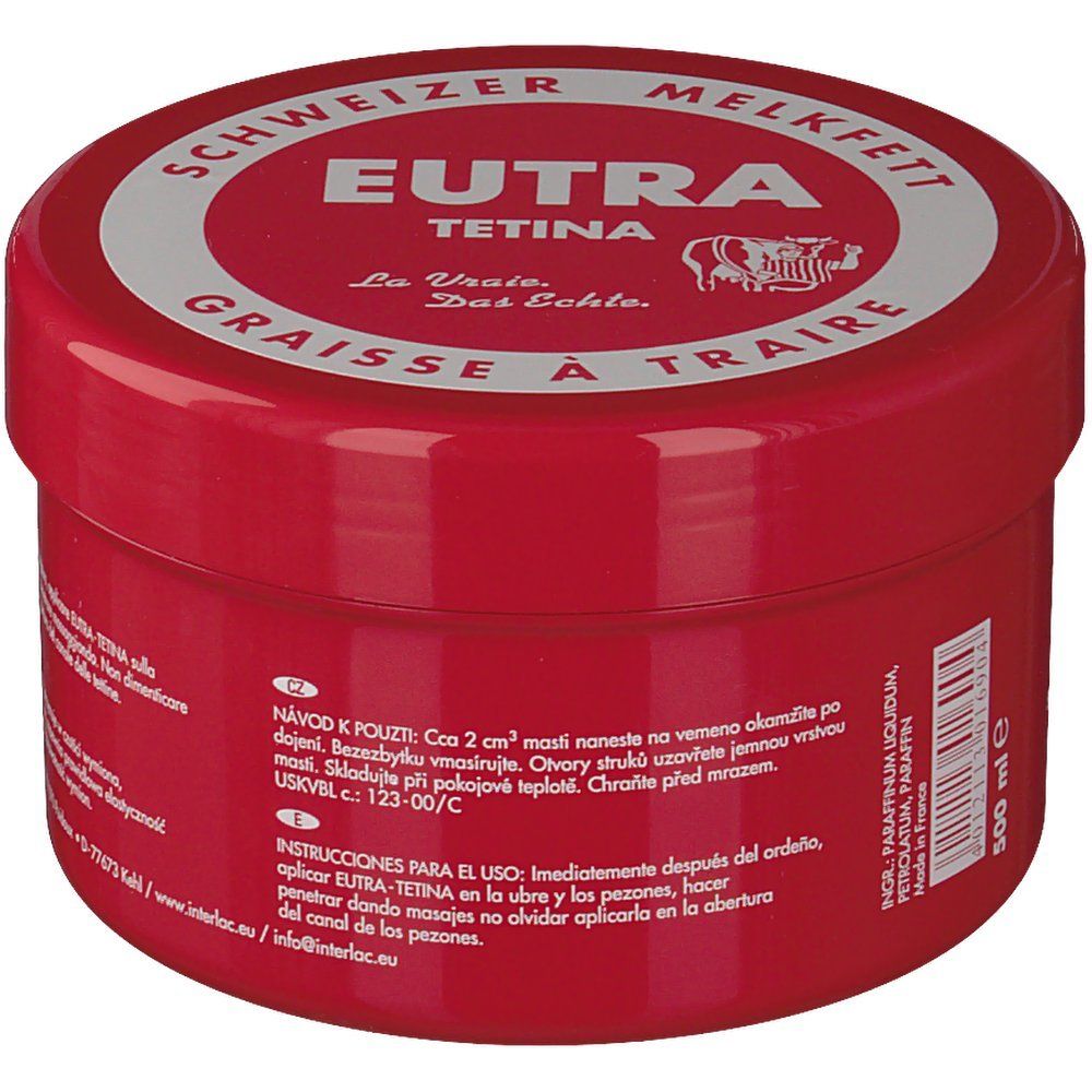 Rode pot met witte deksel. Opschrift: Eutra Tetina, Schweizer Melkfett, Graisse à Traire. Koe-symbool. 500 ml.