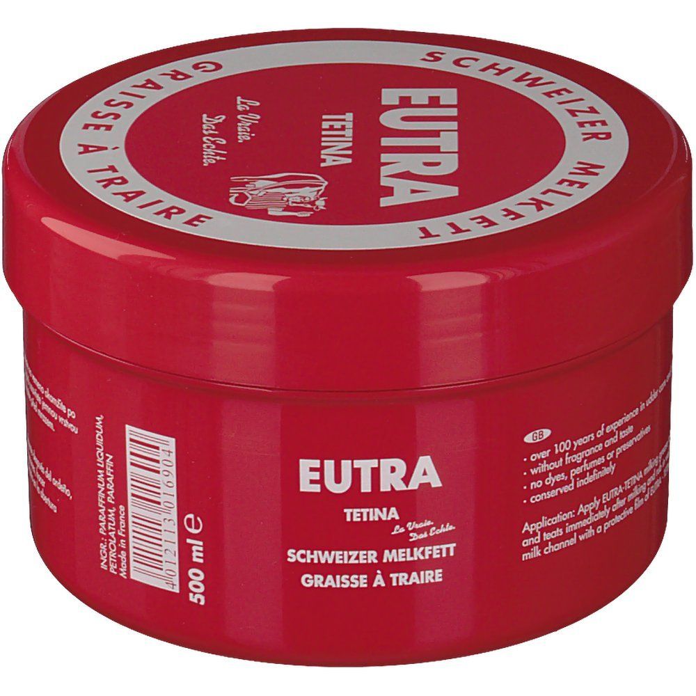 Rode pot met witte deksel. Opschrift: Eutra Tetina, Schweizer Melkfett, Graisse à Traire. 500 ml. Tekst: Zonder geurstoffen, kleurstoffen, bewaarmiddelen.