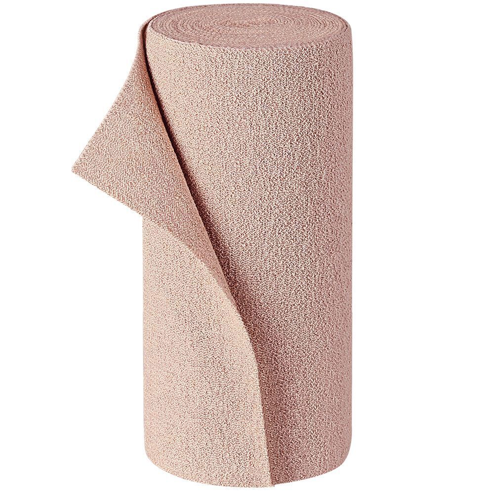 Rouleau de bandage PütterFlex beige. Une extrémité déroulée. Texture visible.