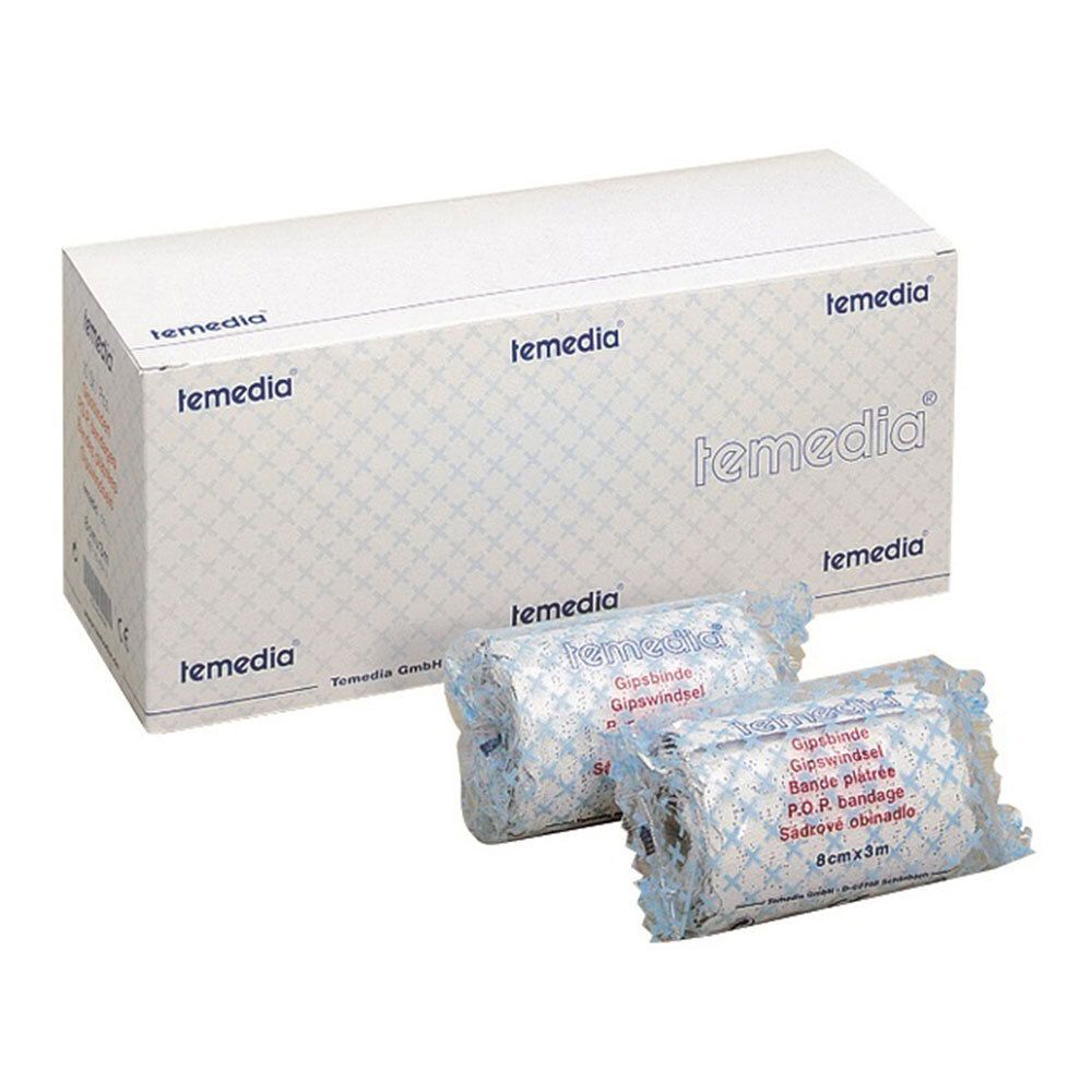 Verpakking met gipsverband. Twee rollen in folie, naast een doos met de tekst "temedia". Op de rollen staat "Gipsbinde".