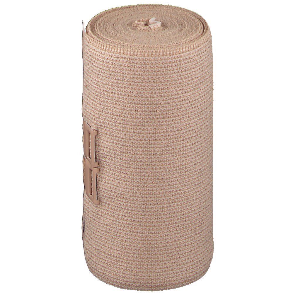 Bande de compression beige enroulée. Sans marquages ni logos visibles.