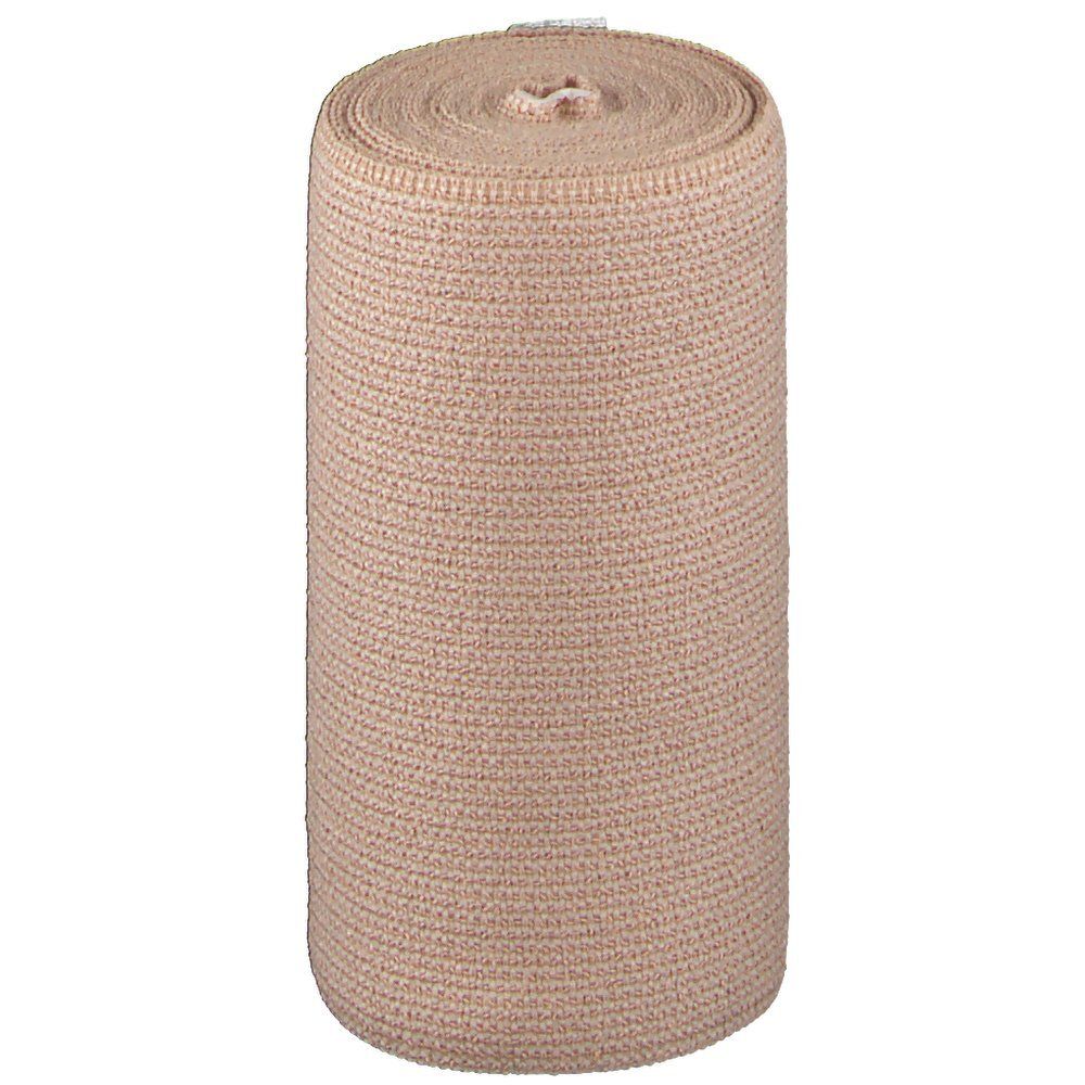 Bande de compression beige enroulée. Sans marquages ni logos visibles.