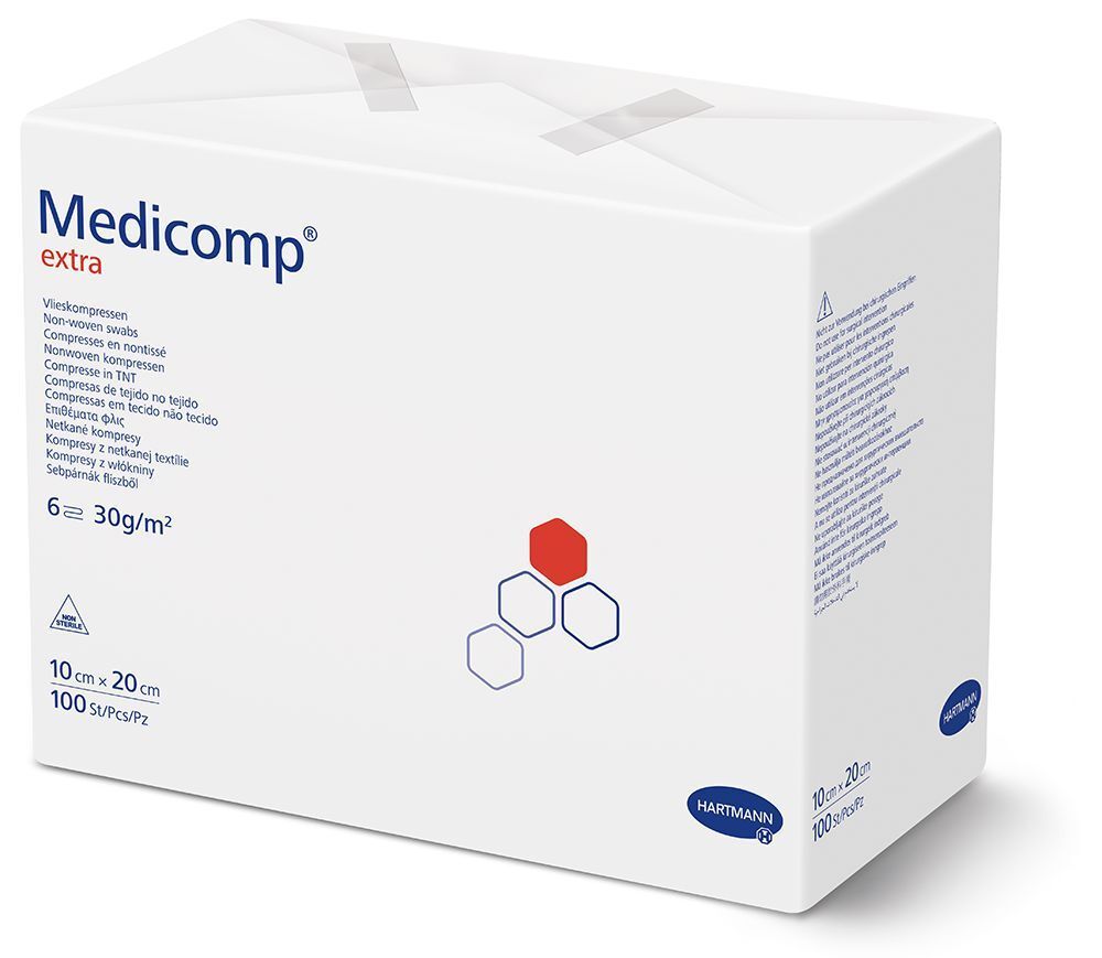 Emballage Hartmann Medicomp extra. Compresses non tissées. Dimensions 10 x 20 cm, 100 pièces. Inscription du nom du produit.