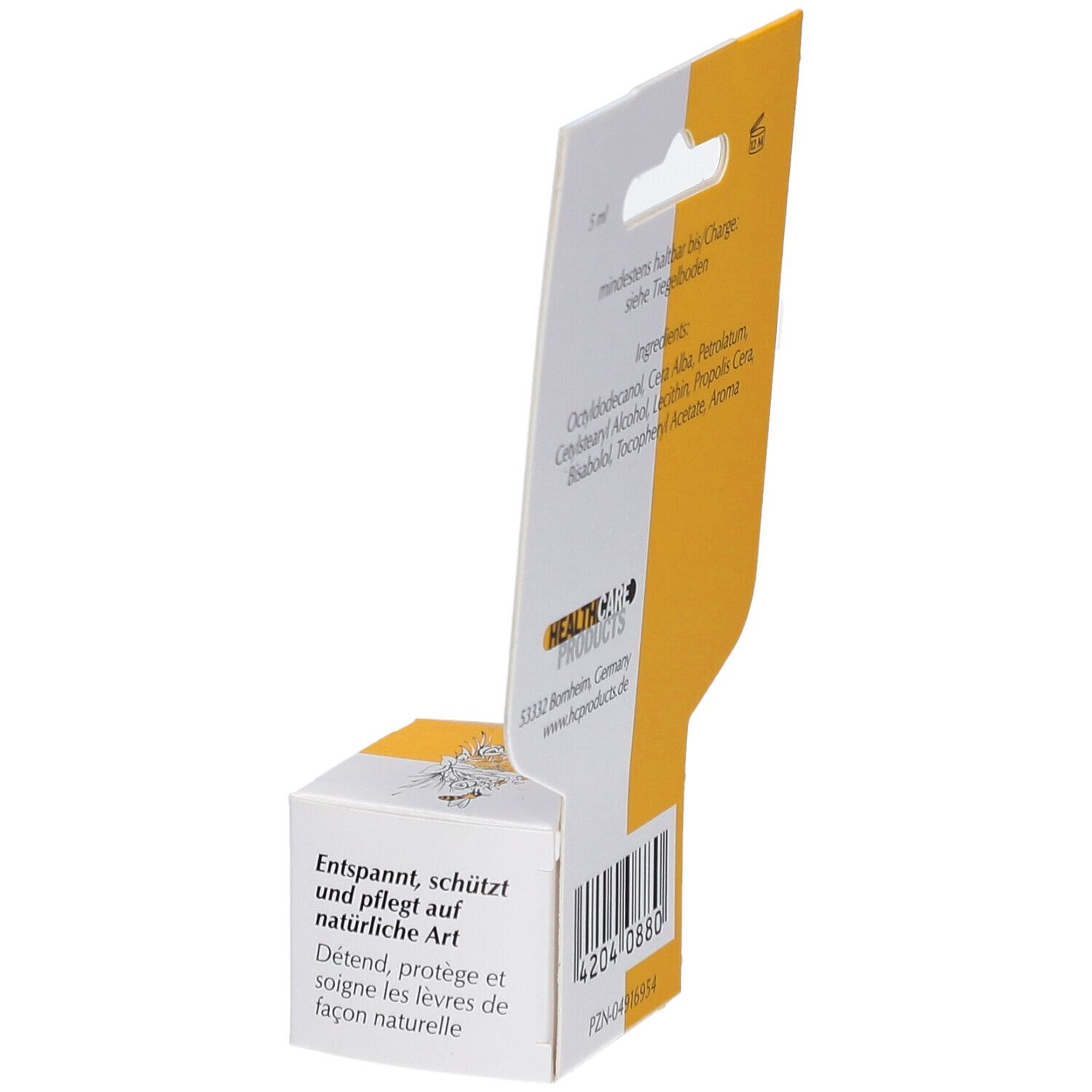 Emballage avec informations sur le produit. Inscription : Détend, protège et soigne de façon naturelle. Emballage jaune et blanc.
