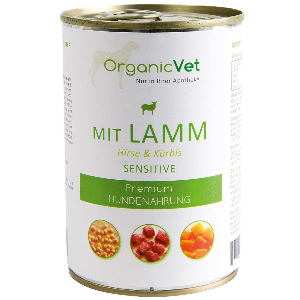 Boîte de nourriture pour chiens avec étiquette. Inscription : MIT LAMM, Hirse & Kürbis. Illustration d'agneau, millet et citrouille. Marque : OrganicVet.