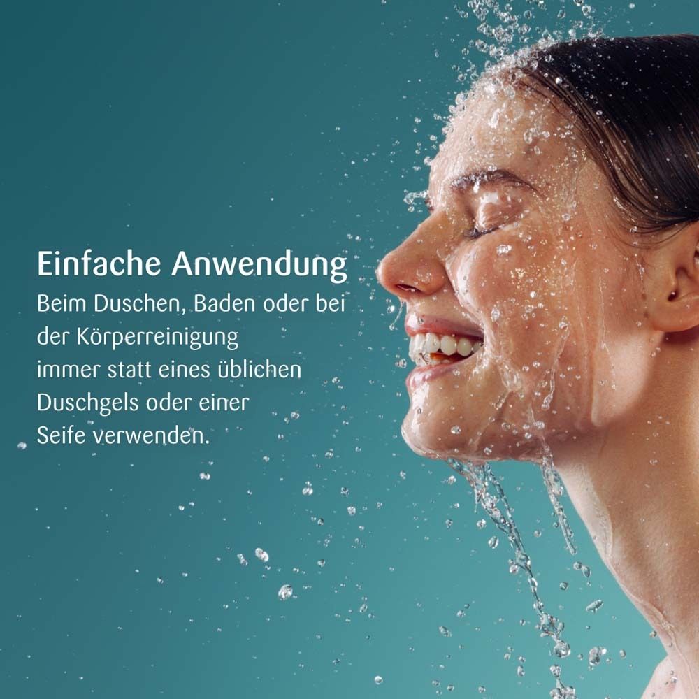 Gezicht van een vrouw in profiel met waterstralen.