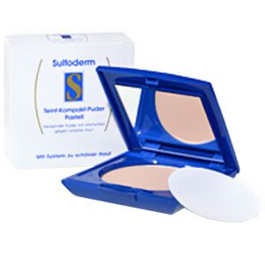 Compact poeder met spiegel en applicator. Blauwe behuizing, witte verpakking met productnaam en logo.