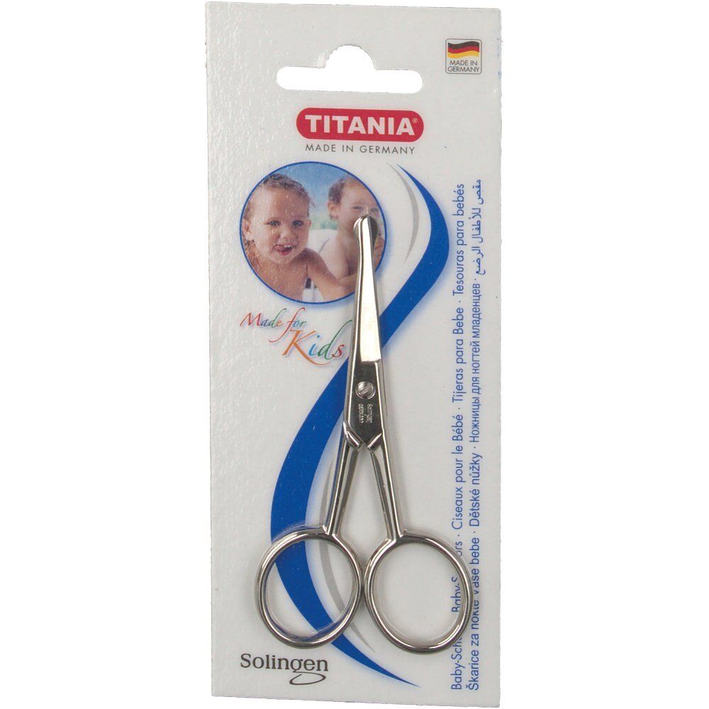 TITANIA babyschaar in blisterverpakking. Metalen schaar met afgeronde punten. Merk en land van herkomst op de verpakking.