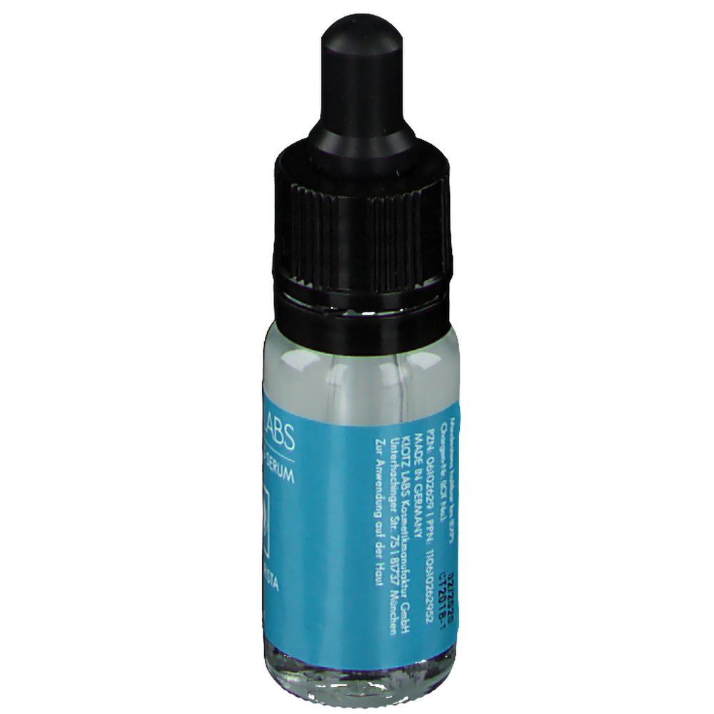 Klotz Labs Contourista serum. Klein glazen flesje met zwarte dop en pipet. Blauw etiket met tekst en logo.