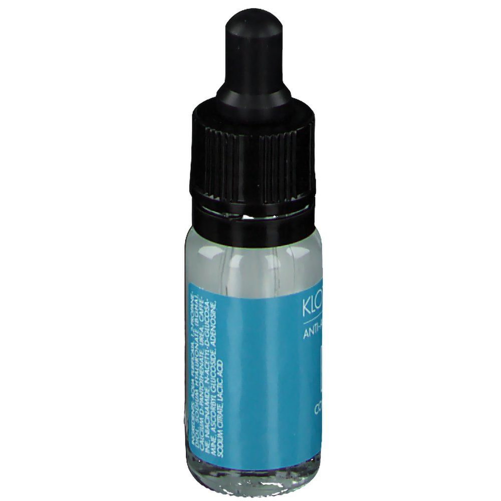 Klotz Labs Contourista serum. Klein glazen flesje met zwarte dop en pipet. Blauw etiket met ingrediënten en tekst.