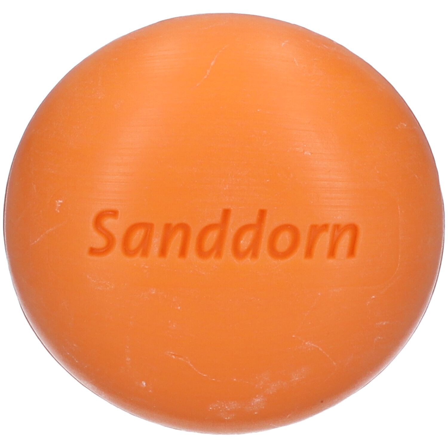 Oranje zeep met opdruk "Sanddorn". Ronde vorm.