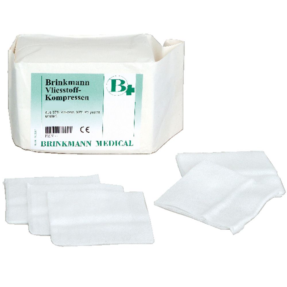Steriele, witte non-woven kompressen in verpakking. Brinkmann Medical. Enkele kompressen ernaast.