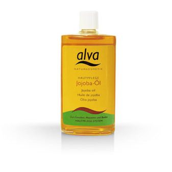 Gele glazen fles met jojoba-olie. Opschrift: alva Naturkosmetik, Hautpflege Jojoba-Öl. Met groene en bruine elementen.