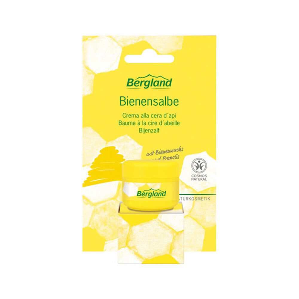 Geel potje "Bergland Bienensalbe" op gele verpakking. "Cosmos Natural"-zegel.