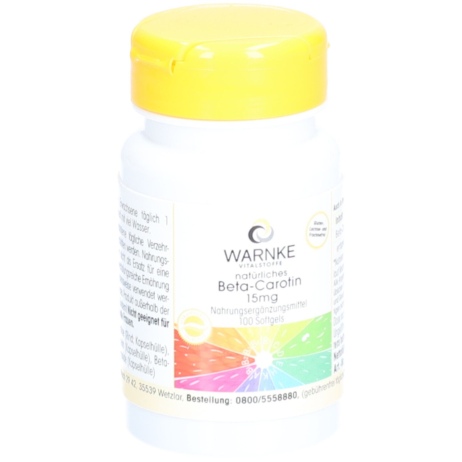 Flacon blanc avec couvercle jaune. Inscription: WARNKE Beta-Carotin 15mg. 100 gélules. Arc-en-ciel coloré.