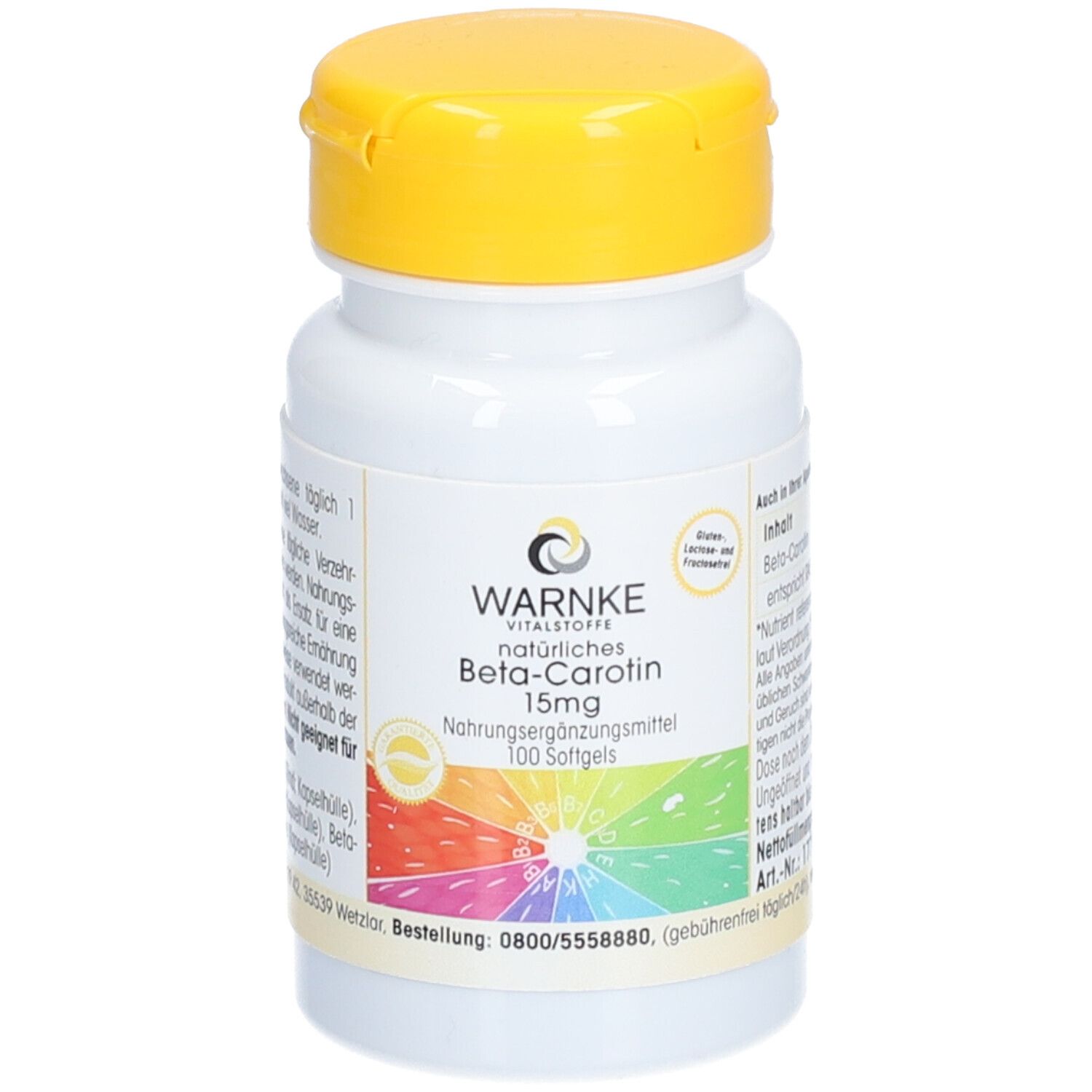 Flacon blanc avec couvercle jaune. Inscription: WARNKE Beta-Carotin 15mg. 100 gélules. Arc-en-ciel coloré.