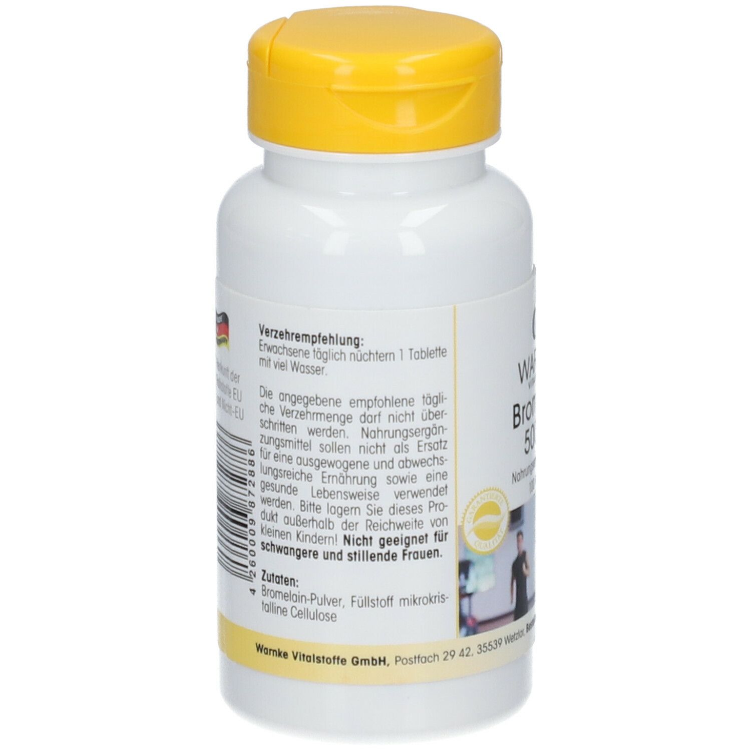 Dos du flacon de comprimés. Texte avec recommandations et ingrédients. Fabriqué en Allemagne. Femme dans un gymnase.