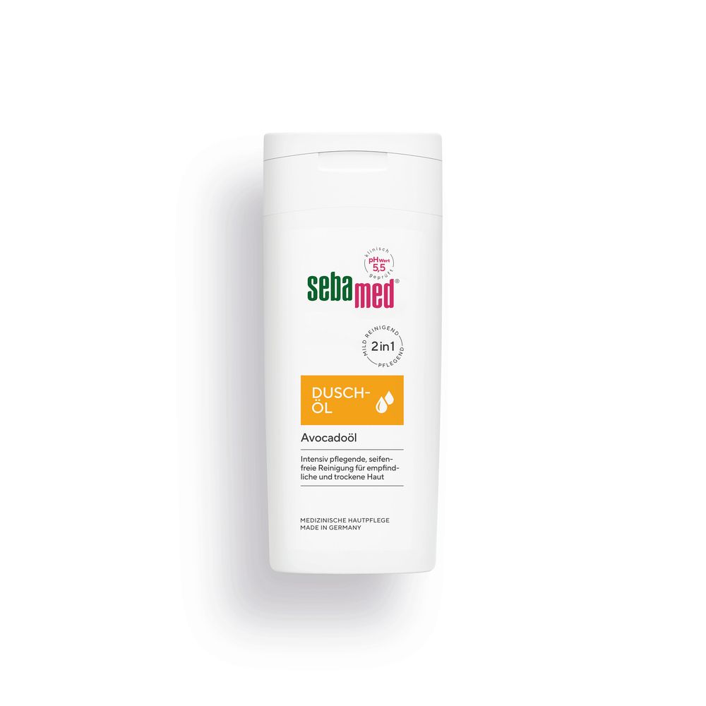 Flacon blanc de sebamed® Duschöl à l'huile d'avocat. Inscription : pH 5,5, 2en1. Étiquette jaune avec nom du produit et ingrédients.