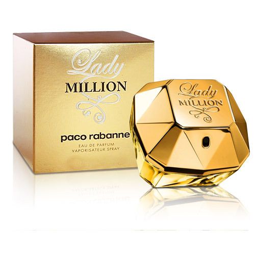 Gouden fles en doos. Opschrift "Lady MILLION" en "paco rabanne". Fles in diamantvorm.