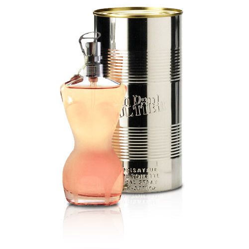 Flacon de parfum en forme de corps féminin, avec une boîte. La marque "Jean Paul Gaultier" est visible.