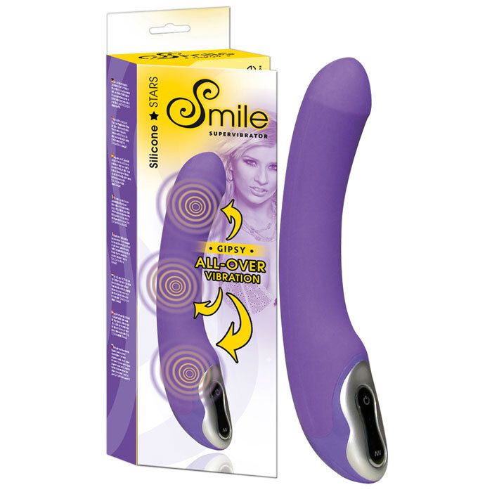 Vibrateur violet avec emballage. L'emballage porte la mention "Smile Supervibrator".