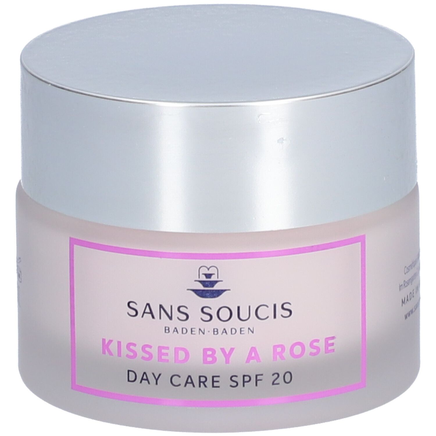 Crèmepot met zilveren deksel. Opschrift: SANS SOUCIS, Kissed by a Rose, Day Care SPF 20.