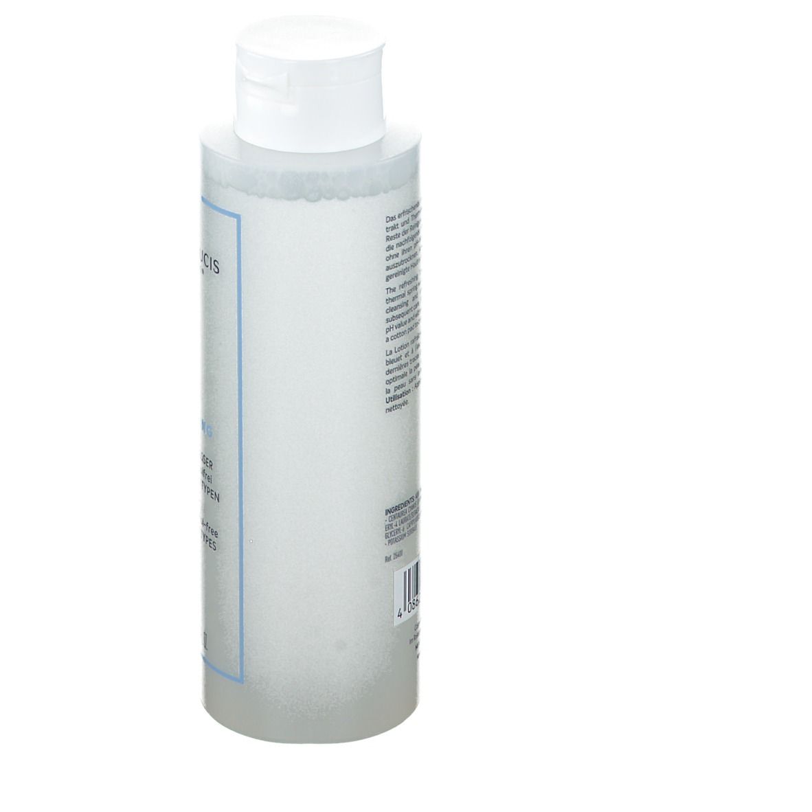 Fles met witte dop, zijaanzicht. Opschrift: SANS SOUCIS. Tekst op de achterkant. Transparante vloeistof zichtbaar.